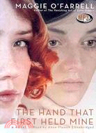 The Hand That First Held Mine 