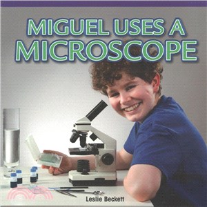 Miguel Uses a Microscope