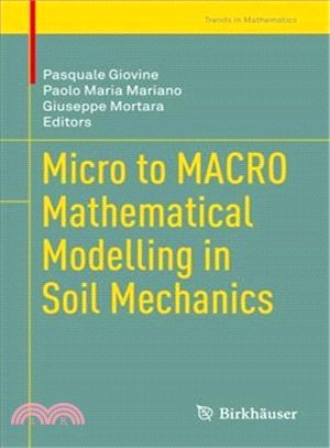 Micro to Macro Mathematical Modelling in Soil Mechanics